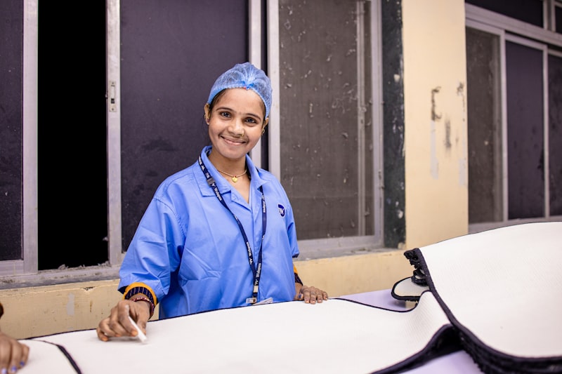 Smiling healthcare provider speaking with a patient